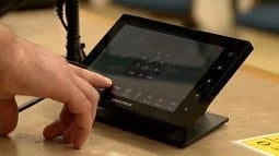 Person operating a Crestron panel