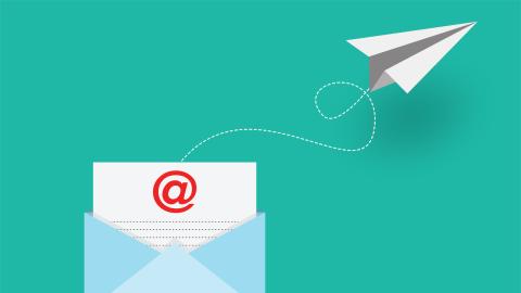 Paper envelope flying from envelope with @ symbol, representing email