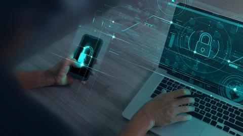 Laptop and smartphone with lock icons